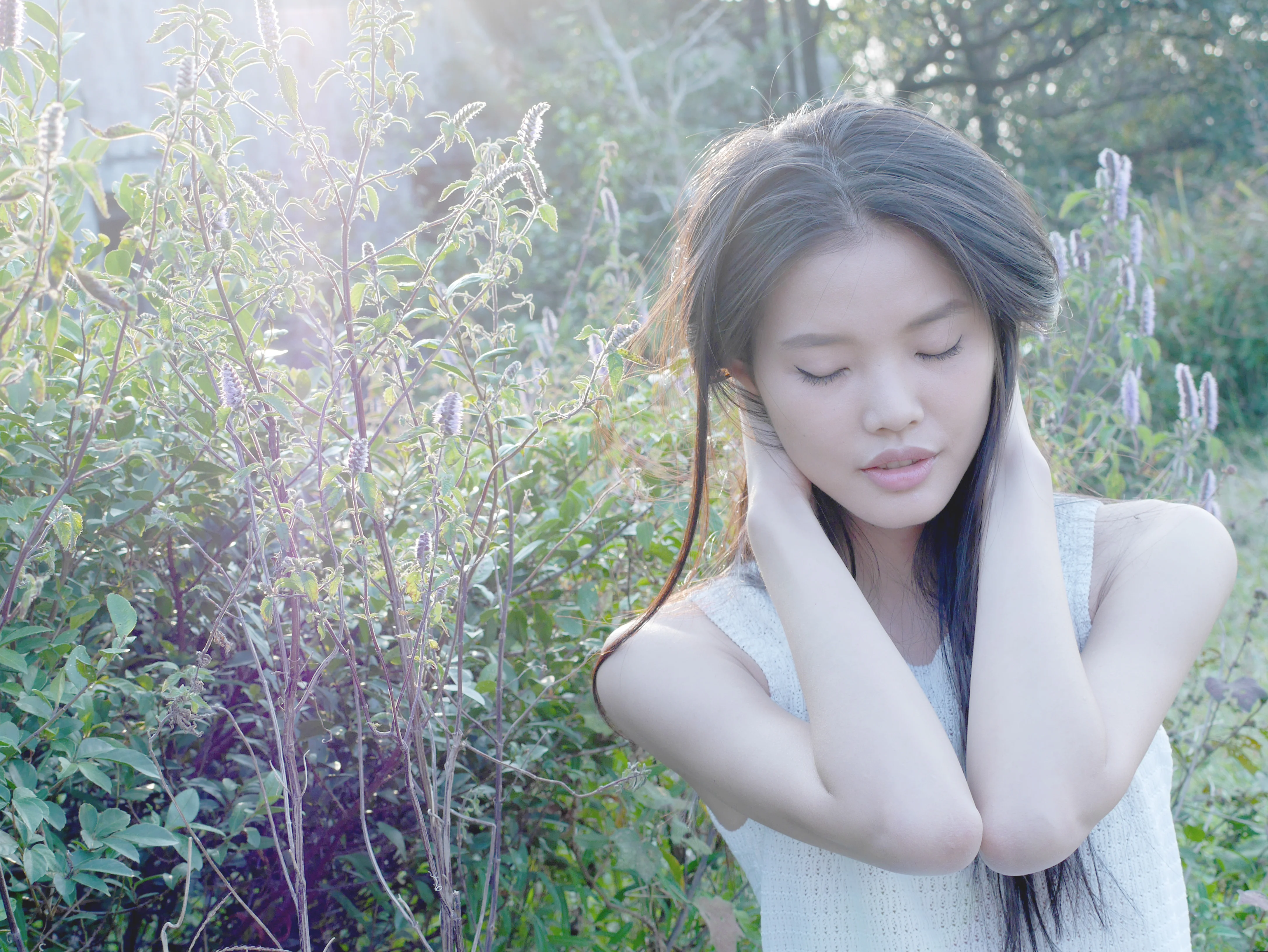 Environmental portrait in a sunlit garden